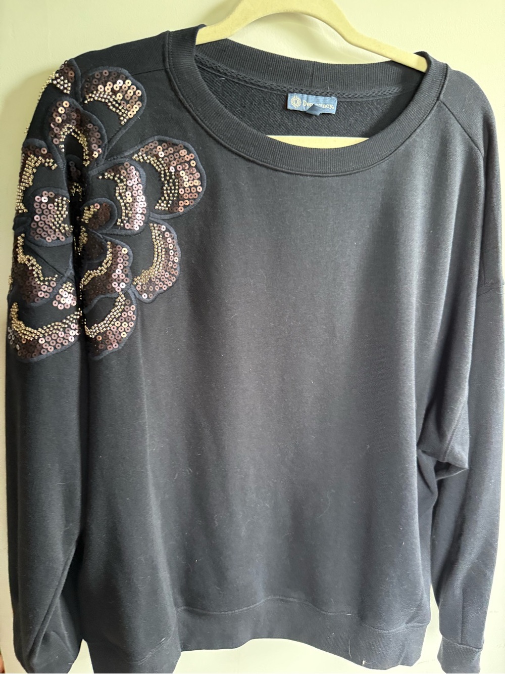 Democracy Black Sweatshirt with Sequin Floral Shoulder Detail